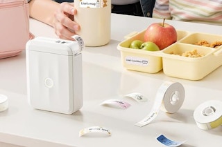 a label maker machine on a table
