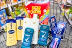 vaseline lotion, dove shampoo, degree deodorant, crest toothpaste, and lucky charms cereal in a cart