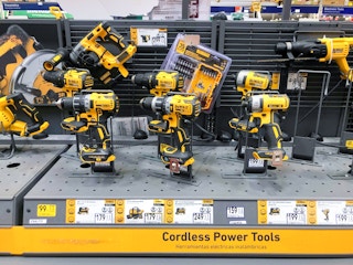 dewalt drills on table-top counter of lowe's store