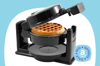 elite gourmet rotating waffle maker on a blue and white background