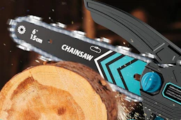 a mini chainsaw against wood