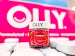 Olly Women's Health Gummies in Walmart store in front of signage 