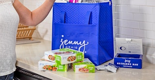 Someone taking food out of a Jenny Craig bag