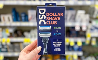 hand holding dollar shave club razor kit