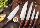 Japanese chef knives on a wooden cutting board