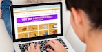 person on laptop looking at wayfair way day deals