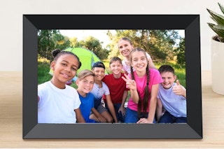 a digital picture frame on a table