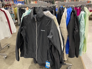 A variety of Columbia jackets hanging in a Dicks Sporting Goods