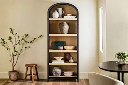 Lifestyle image of the Walker Edison Arched Bookcase in home setting