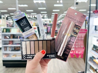 hand holding up makeup at Target