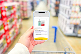 hand holding a smartphone displaying a 1-clip coupon in the kcl app