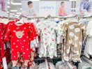 carter's holiday sleep & plays sitting on a target shelf