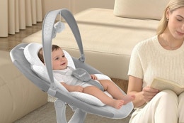 a woman near a baby swing