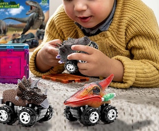 a kid playing with dinosaur pull toys