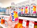 hand holding a bottle of hint flavored water at target