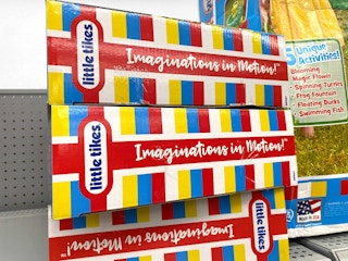 little tikes boxes stacked in a pile at walmart
