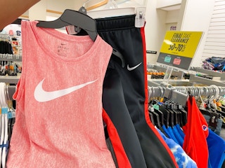 hand holding Nike apparel