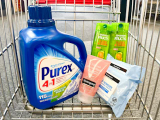 purex detergent, neutrogena wipes and face wash, and garnier shampoo in a cart