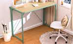 Lifestyle image of the Mainstays Folding Desk in "Sage Green"