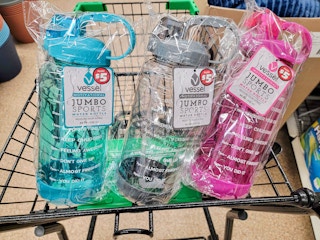 3 motivational water bottles in a cart