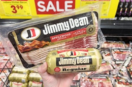 hand holding jimmy dean bacon and sausage