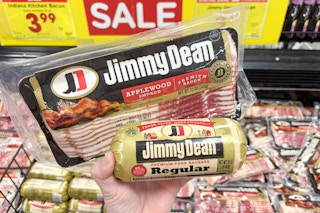 hand holding jimmy dean bacon and sausage