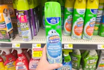hand holding up scrubbing bubbles bathroom cleaner