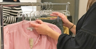 Someone shopping at a LOFT store