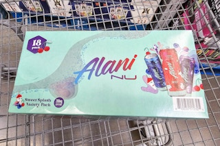 box of alani nu energy drinks in a cart