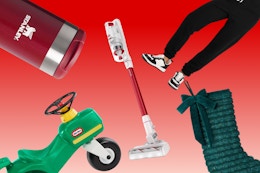 Stanley cup, Little Tike tractor, Bissell vacuum, black joggers, and green stocking