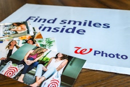 walgreens photos on top of a Walgreens photo envelope.