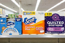 toilet paper packs on a store shelf