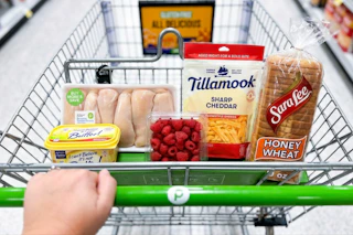 tilamook, sara lee, and more groceries in a publix shopping cart