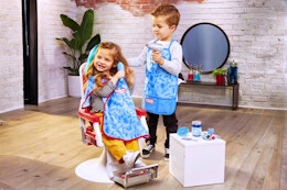Lifestyle image if kids playing with the Little Tikes Hair Salon Beauty Set