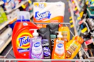 scott toilet paper, tide detergent, axe body wash, garner whole blends shampoo, and dial soap in a cart