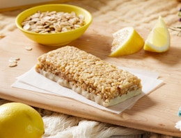 a Luna bar on a cutting board with lemons 