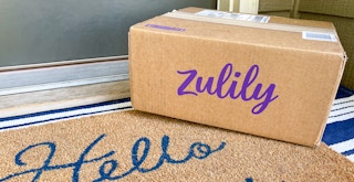 zulily shipping online shopping delivery box mail package front door porch mat shipment featured crop 1673645677 1673645677