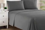 grey king size sheets on a bed