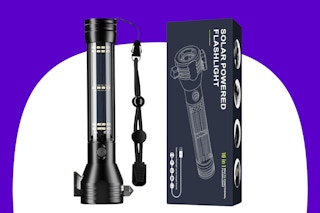 a flashlight next to it's packaging 