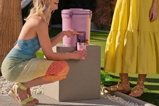 women using a stanley 2 gal jug
