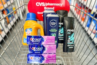 arm & hammer detergent, crest toothpaste, nivea body wash, and axe body wash in a cart