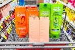 loreal elvive, garnier fructis, and monday hair care products in a cart