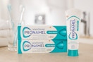Sensodyne Pronamel on counter next to toothbrushes