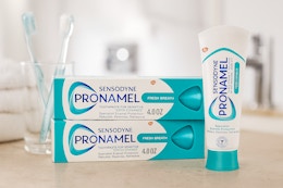 Sensodyne Pronamel on counter next to toothbrushes