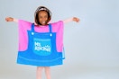 child wearing a Ms. rachel cover up