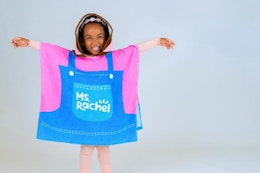 child wearing a Ms. rachel cover up