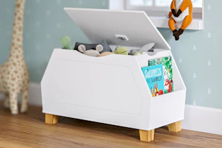 Lifestyle image of a white toy storage box in kids room setting