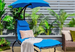 a blue swing lounger