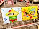 gushers and motts fruit snacks in a cart