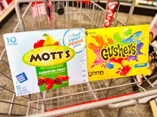 gushers and motts fruit snacks in a cart